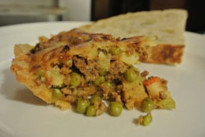 Meat pie with Gouda top crust